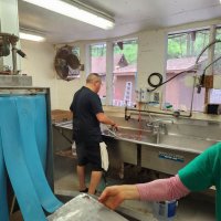 Ruben and Kristi cleaning