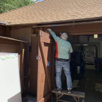 Steve painting dining hall doors